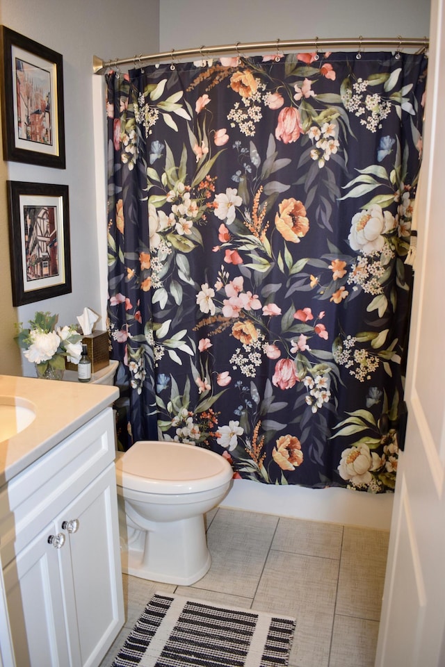12424 126th Ave NE, Thief River Falls, MN 56701 - bathroom featuring vanity, tile patterned floors, toilet, and a shower with curtain