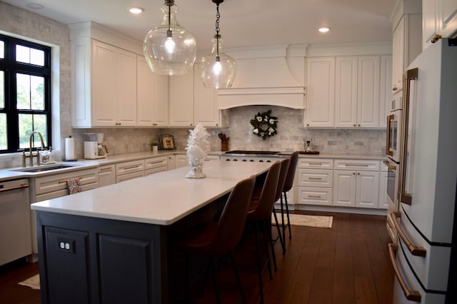 12424 126th Ave NE, Thief River Falls, MN 56701 - kitchen with white refrigerator, a sink, dishwasher, white cabinetry, and dark wood-style floors