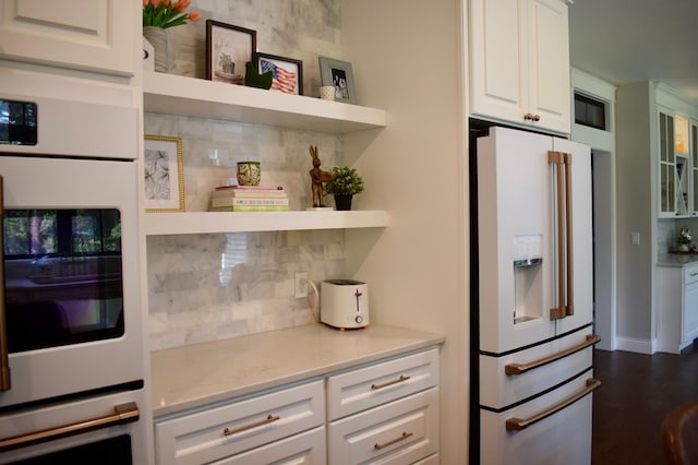 12424 126th Ave NE, Thief River Falls, MN 56701 - kitchen with white appliances, open shelves, decorative backsplash, white cabinetry, and dark wood-style flooring