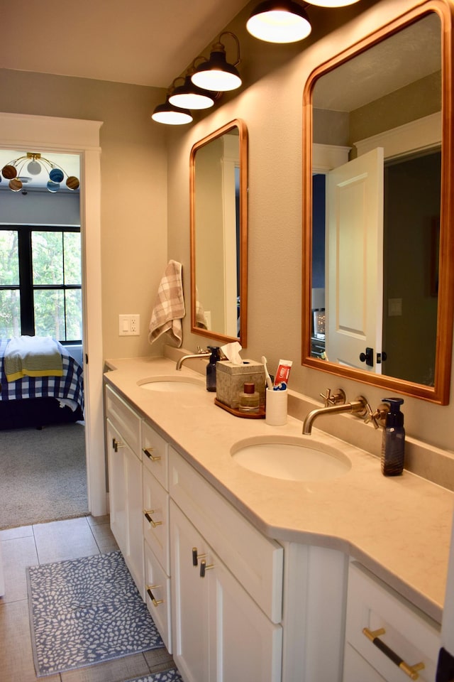 12424 126th Ave NE, Thief River Falls, MN 56701 - bathroom with connected bathroom, double vanity, and tile patterned flooring