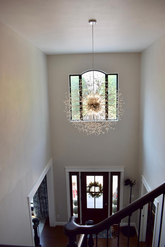 12424 126th Ave NE, Thief River Falls, MN 56701 - foyer entrance featuring a chandelier, a high ceiling, and wood finished floors