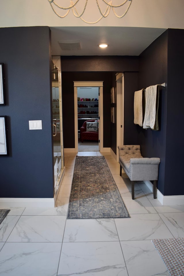 12424 126th Ave NE, Thief River Falls, MN 56701 - foyer entrance featuring baseboards, light marble finish flooring, and recessed lighting