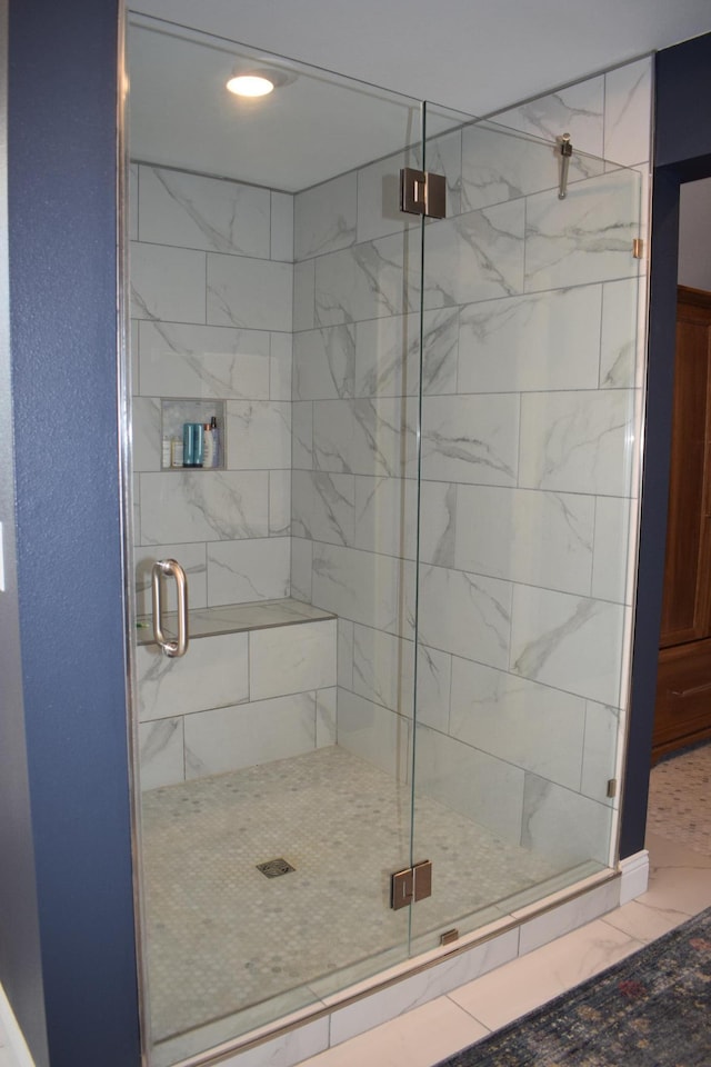 12424 126th Ave NE, Thief River Falls, MN 56701 - full bathroom with marble look tile flooring and a shower stall
