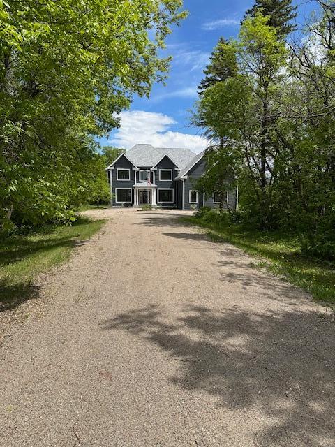12424 126th Ave NE, Thief River Falls, MN 56701 - view of front of house with dirt driveway