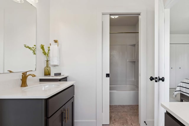 full bath featuring vanity and bathing tub / shower combination