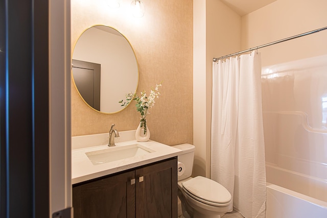 full bath with toilet, vanity, and shower / bath combination with curtain