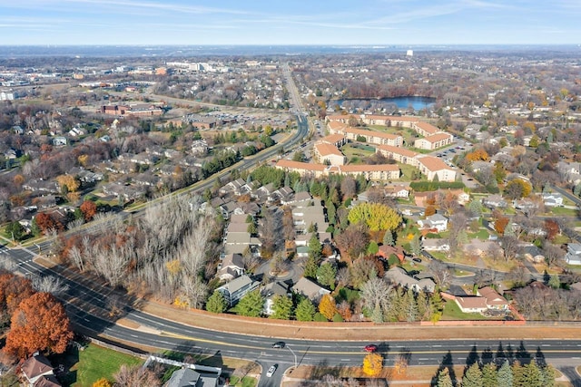 bird's eye view with a water view and a residential view