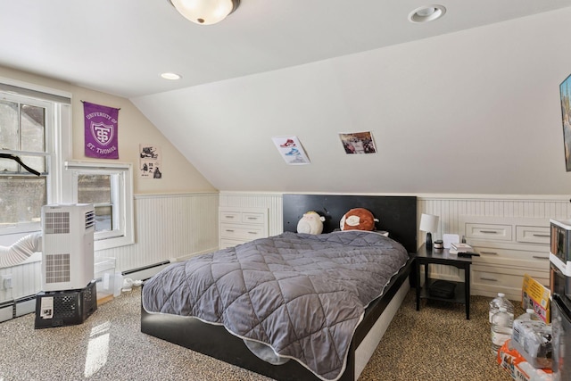 carpeted bedroom featuring recessed lighting, a wainscoted wall, lofted ceiling, and a baseboard heating unit