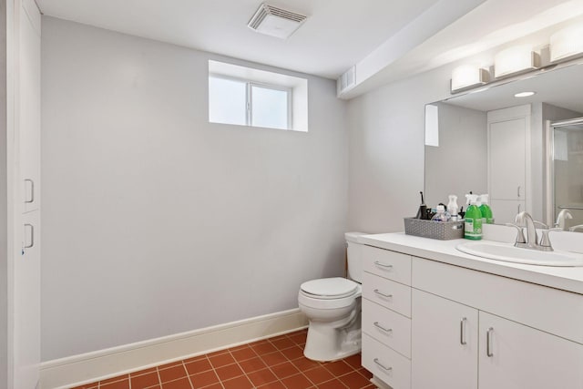 bathroom with visible vents, toilet, a shower stall, tile patterned flooring, and baseboards