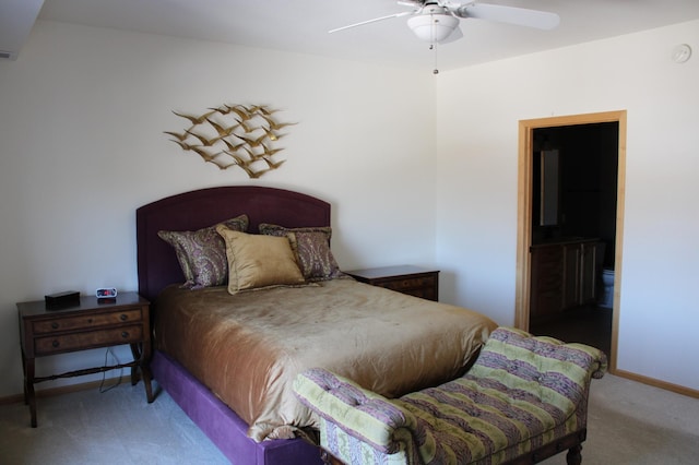 bedroom featuring ceiling fan, carpet, baseboards, and connected bathroom