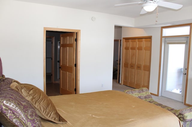 bedroom with multiple windows, carpet, and ceiling fan