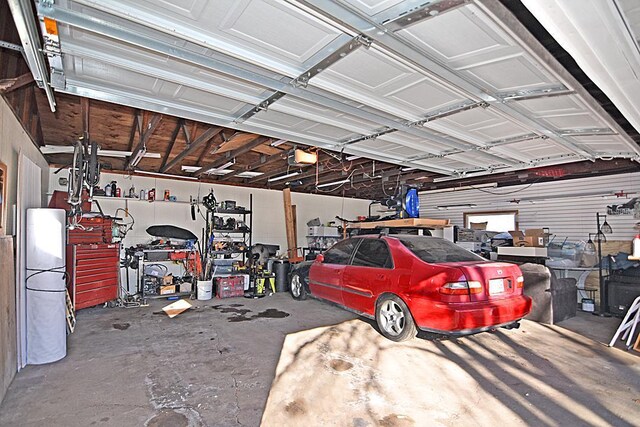 garage with a workshop area