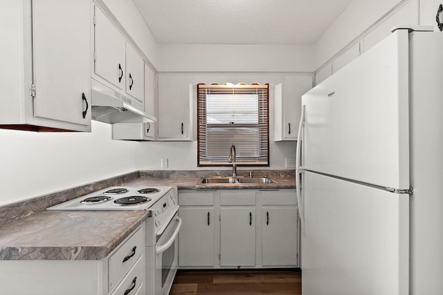 kitchen with white appliances, a sink, dark wood-type flooring, white cabinets, and under cabinet range hood