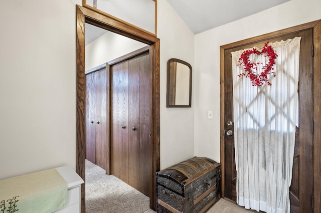 entryway with light carpet