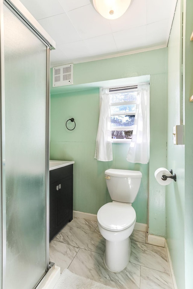 full bath with vanity, baseboards, marble finish floor, and a stall shower