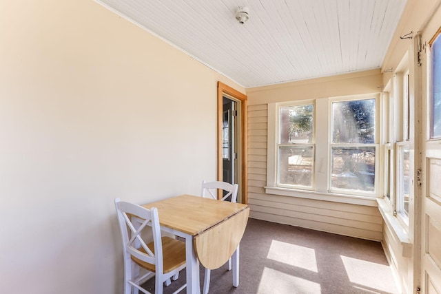 sunroom / solarium with wooden ceiling