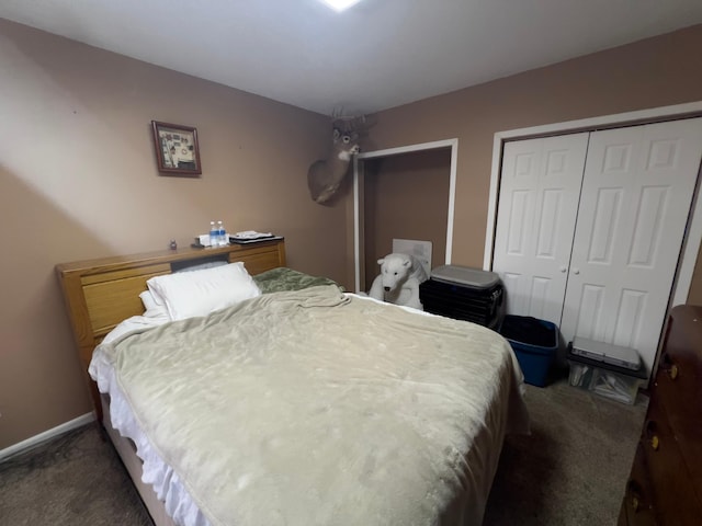 carpeted bedroom with baseboards