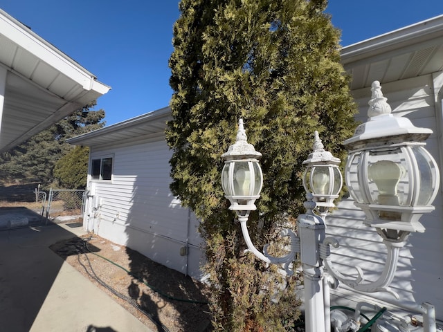 view of property exterior featuring a gate