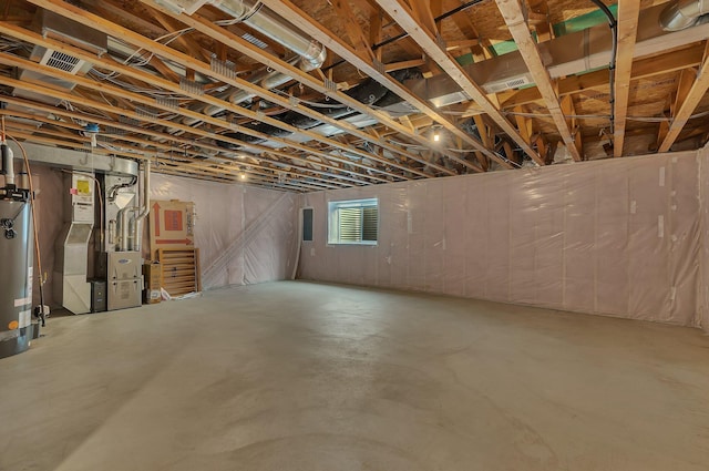 basement with heating unit and water heater