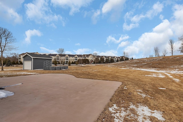 view of yard with an attached garage