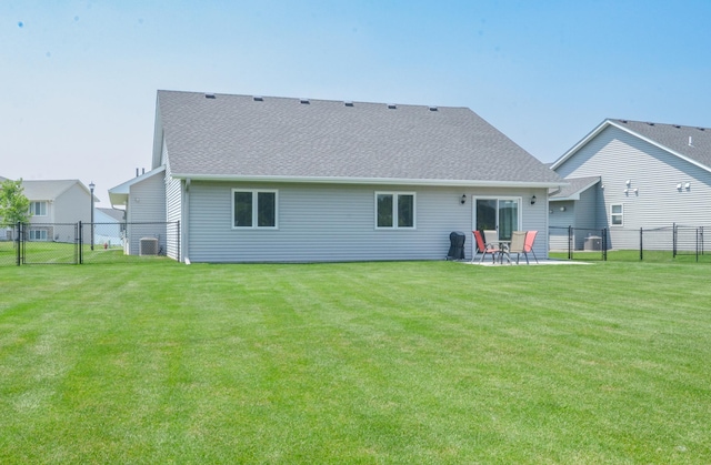 324 Bluebird Dr NW, Isanti, MN 55040 - rear view of property with a gate, a fenced backyard, roof with shingles, and a patio area