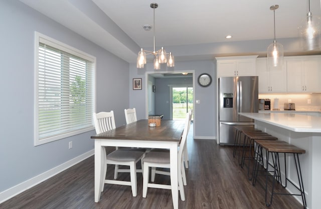 324 Bluebird Dr NW, Isanti, MN 55040 - dining area with dark wood-style floors and recessed lighting