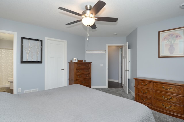 324 Bluebird Dr NW, Isanti, MN 55040 - bedroom with carpet flooring, ensuite bathroom, and a ceiling fan