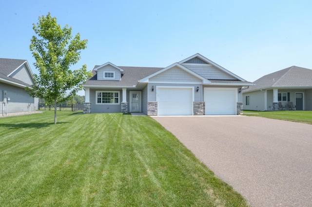 324 Bluebird Dr NW, Isanti, MN 55040 - craftsman-style home featuring an attached garage, stone siding, and driveway