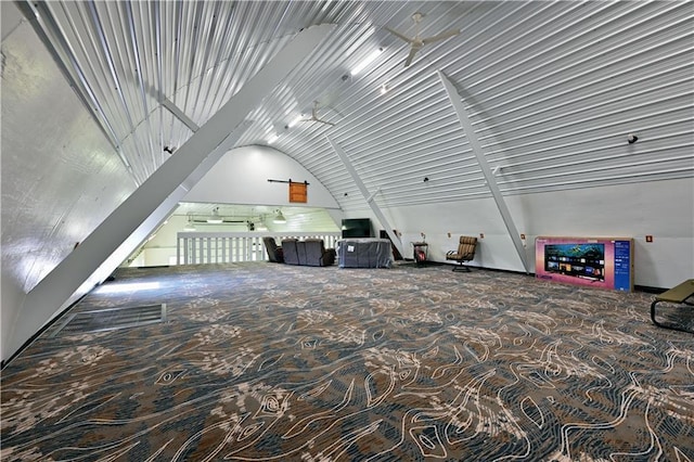 living area featuring vaulted ceiling