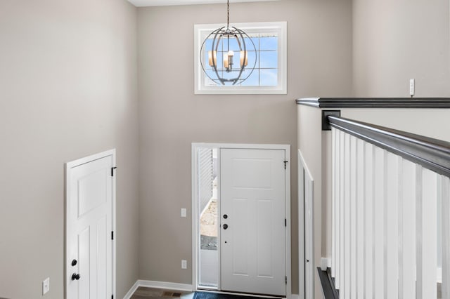 1003 Misty Meadow Blvd, Buffalo, MN 55313 - foyer entrance featuring a chandelier and baseboards