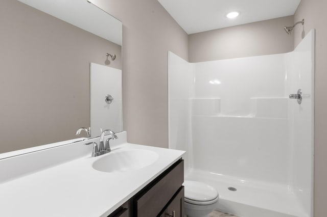 1003 Misty Meadow Blvd, Buffalo, MN 55313 - bathroom with vanity, toilet, and a shower