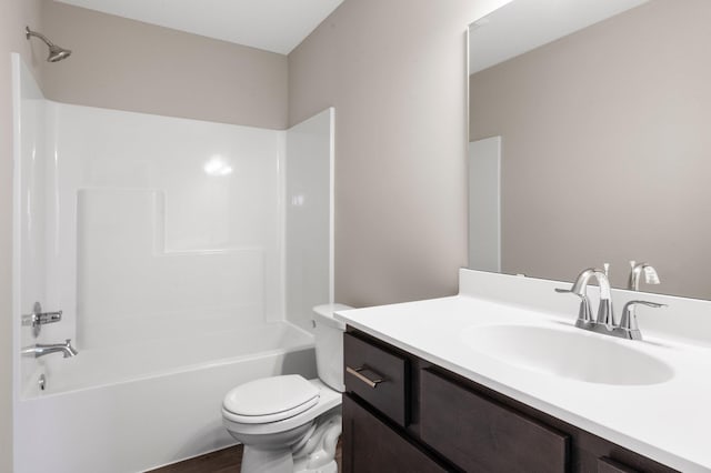 1003 Misty Meadow Blvd, Buffalo, MN 55313 - bathroom with vanity, toilet, shower / bath combination, and wood finished floors