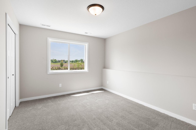 1003 Misty Meadow Blvd, Buffalo, MN 55313 - unfurnished bedroom featuring carpet, baseboards, and a closet
