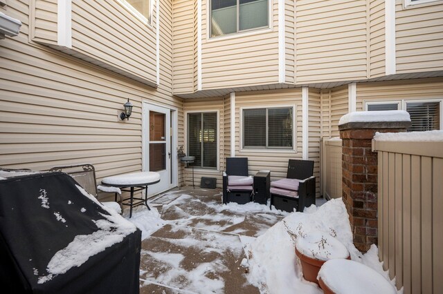 view of snow covered patio