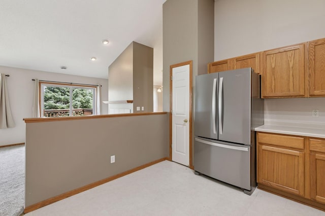 15374 Flower Way, Apple Valley, MN 55124 - kitchen with baseboards, freestanding refrigerator, lofted ceiling, and light countertops