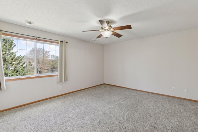 15374 Flower Way, Apple Valley, MN 55124 - carpeted empty room with a textured ceiling, a ceiling fan, and baseboards