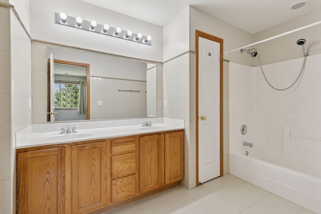 15374 Flower Way, Apple Valley, MN 55124 - bathroom with shower / tub combination, a sink, double vanity, and tile patterned floors