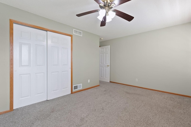 15374 Flower Way, Apple Valley, MN 55124 - unfurnished bedroom with carpet flooring, a closet, visible vents, and baseboards