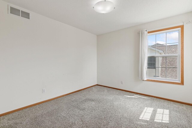15374 Flower Way, Apple Valley, MN 55124 - carpeted spare room featuring visible vents and baseboards