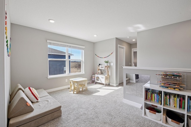 interior space featuring recessed lighting, baseboards, and carpet floors