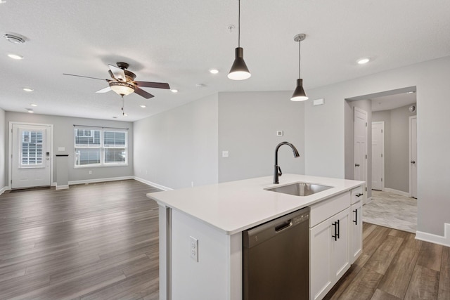 8730 Parkington Ave NE, Otsego, MN 55330 - kitchen featuring a sink, ceiling fan, decorative light fixtures, dark wood finished floors, and dishwashing machine