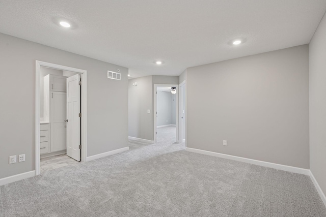 8730 Parkington Ave NE, Otsego, MN 55330 - interior space featuring baseboards, visible vents, recessed lighting, and carpet flooring