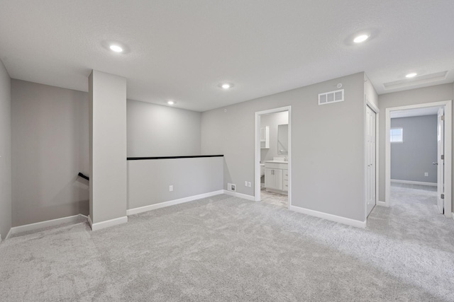 8730 Parkington Ave NE, Otsego, MN 55330 - basement with baseboards, visible vents, and carpet flooring