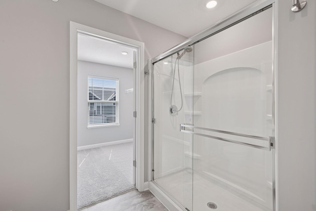 8730 Parkington Ave NE, Otsego, MN 55330 - bathroom featuring recessed lighting, baseboards, and a stall shower