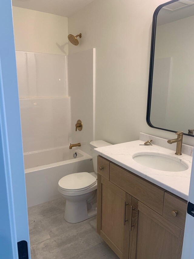 full bathroom with toilet, bathing tub / shower combination, and vanity