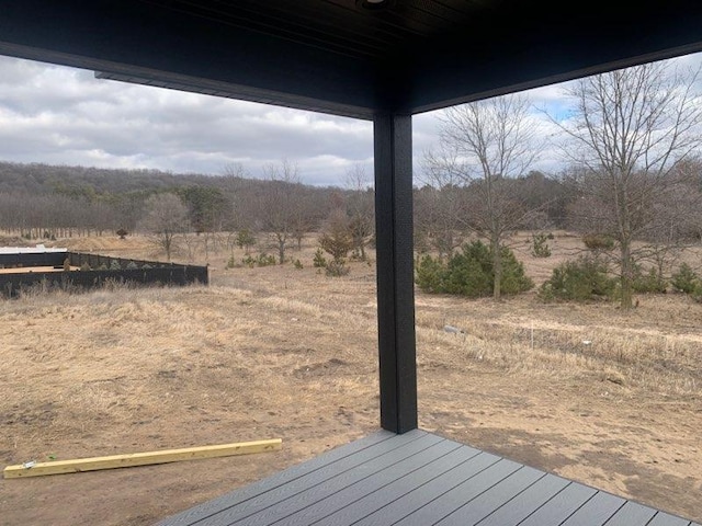 view of yard with a rural view