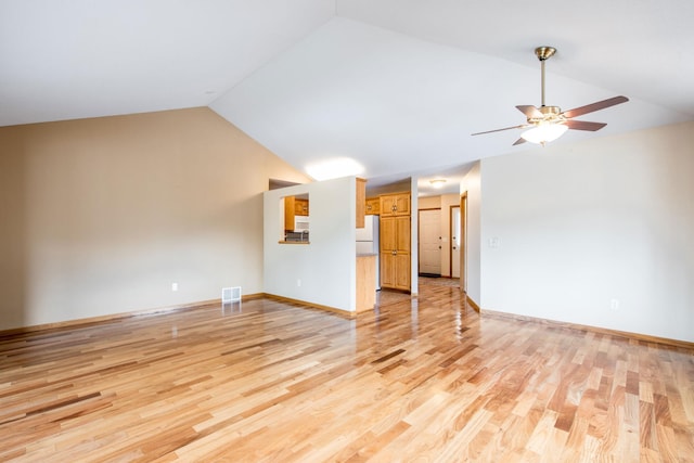 unfurnished living room with visible vents, ceiling fan, light wood-type flooring, and lofted ceiling