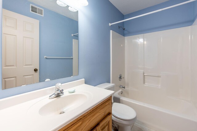 bathroom with visible vents, vanity, toilet, and shower / bathtub combination