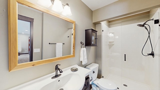 full bath with a shower stall, toilet, and vanity