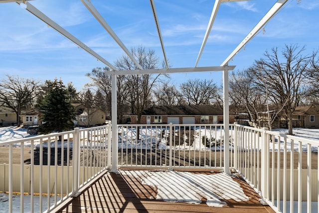 wooden terrace with a residential view